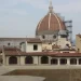 De koepel van de Duomo en de Campanile boven de daken van Florence